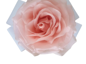 Pale pink fabric rose with white ribbon