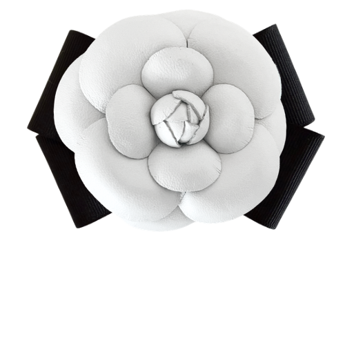 White leather camellia flower with black ribbon